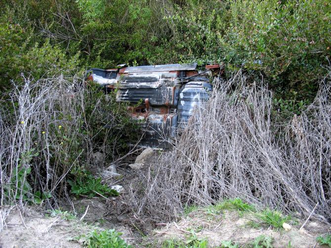 Overturned Car in a Ravine