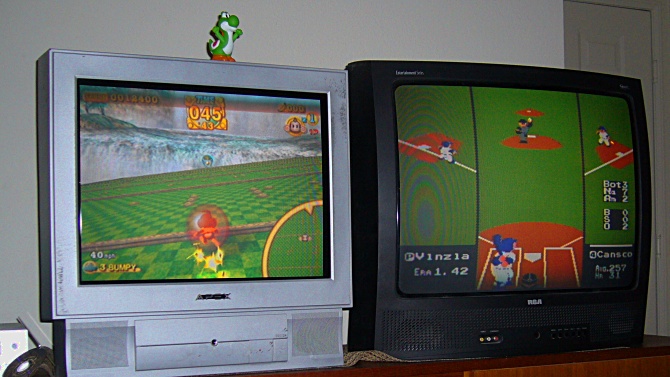 Gamecube with Super Monkey Ball 2 on the left. NES with RBI Baseball on the right.